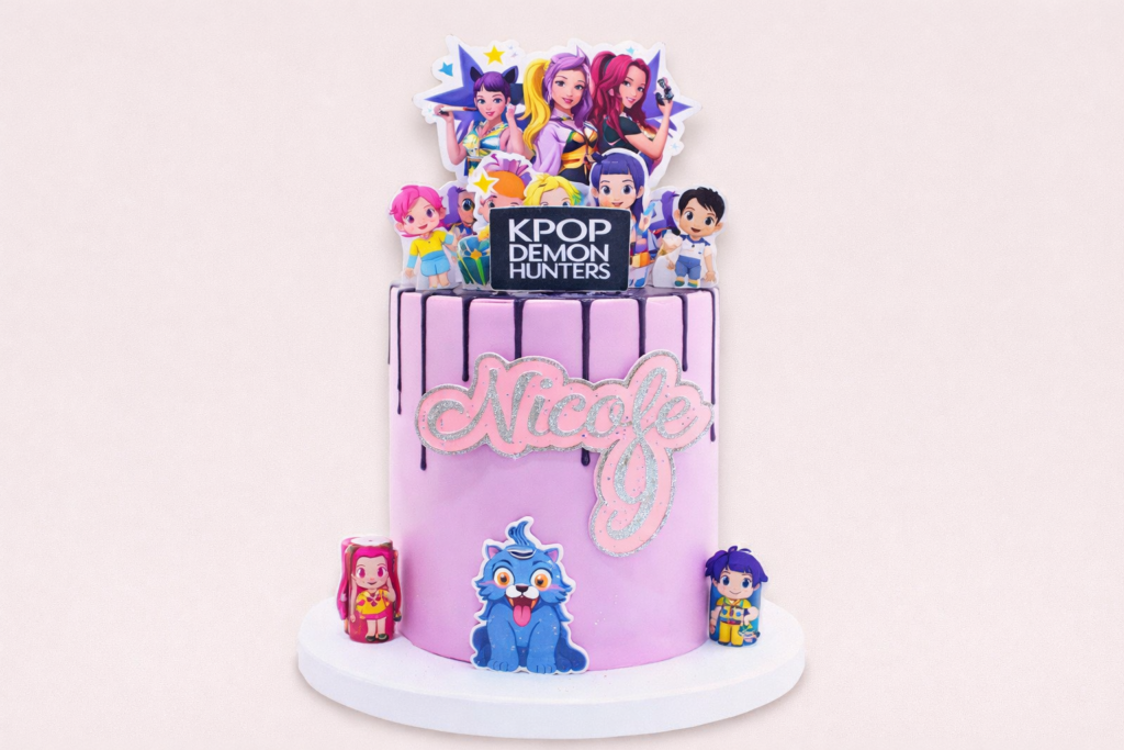 A colorful cake decorated with various cartoon characters